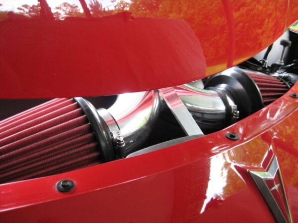 Installed photo of the Dual Intake kit in polished aluminum on a Pontiac Solstice.