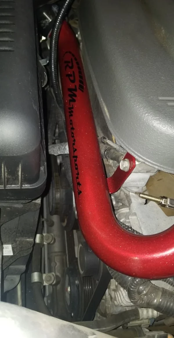 Pontiac Solstice and Saturn Sky Coolant Return Pipe shown installed in Metallic Red.