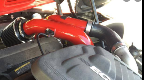 Installed photo of the RPM Motorsports Cold Air Intake on a Pontiac Solstice GXP, painted in Race Red.