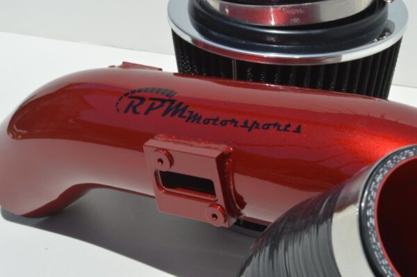 Close up of the MAF port on the Short Ram Cold Air Intake Kit for the Pontiac Solstice GXP and Saturn Sky Redline painted in Metallic Red color.