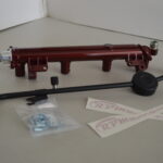 Upgraded Ecotec Fuel Rail for 2.2L and 2.4L painted in red by RPM Motorsports